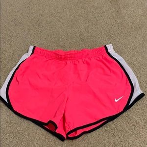 Bright pink kids Nike shorts
